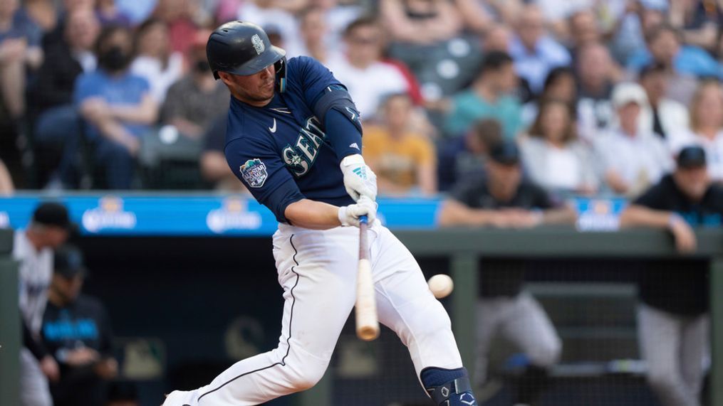 Seattle Mariners' Ty France hits a three-run home run off Miami Marlins starting pitcher Jesus Luzardo during the second inning of a baseball game, Monday, June 12, 2023, in Seattle. (AP Photo/Stephen Brashear)