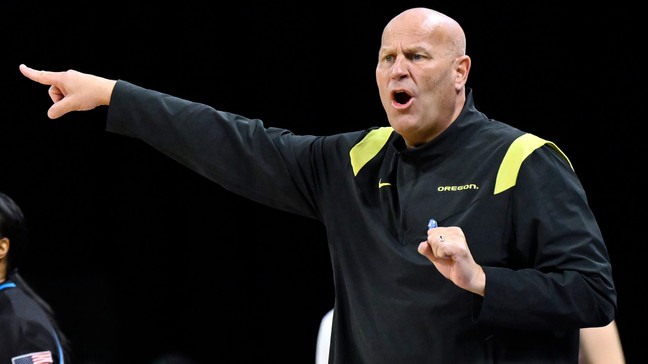 Oregon coach Kelly Graves calls out to the team during the second half of an NCAA college basketball game against Washington in the first round of the Pac-12 women's tournament Wednesday, March 1, 2023, in Las Vegas. (AP Photo/David Becker)