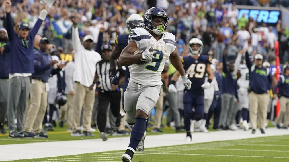 Seattle Seahawks running back Kenneth Walker III's status for Sunday's game at Carolina is unknown after he suffered an ankle injury in a win over the Rams (AP Photo/Mark J. Terrill)