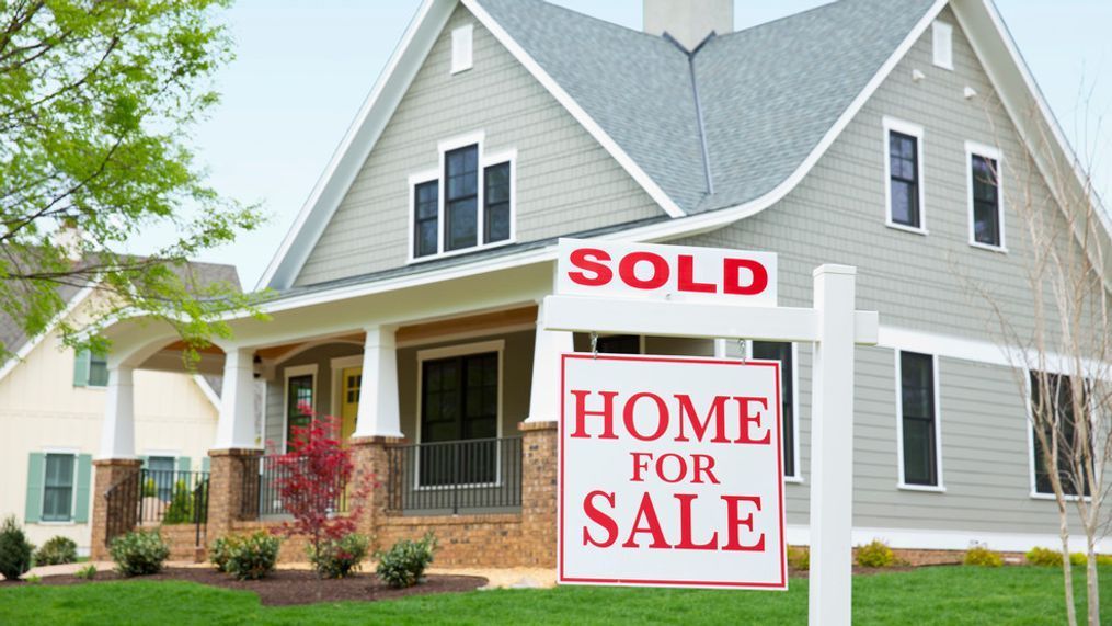 FILE - A house with a sold sign out front. Most Puget Sound area homeowners can save more than $500 a year by switching from their current insurance company to a lower-priced one.{&nbsp;} (Getty Images)