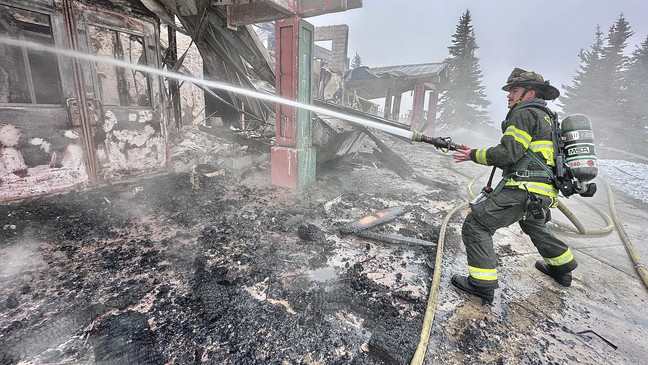 Fire crews work on a fire at the Hurricane Ridge Day Lodge in the late afternoon on May 7, 2023. (Photo courtesy of the Clallam 2 Fire Rescue)
