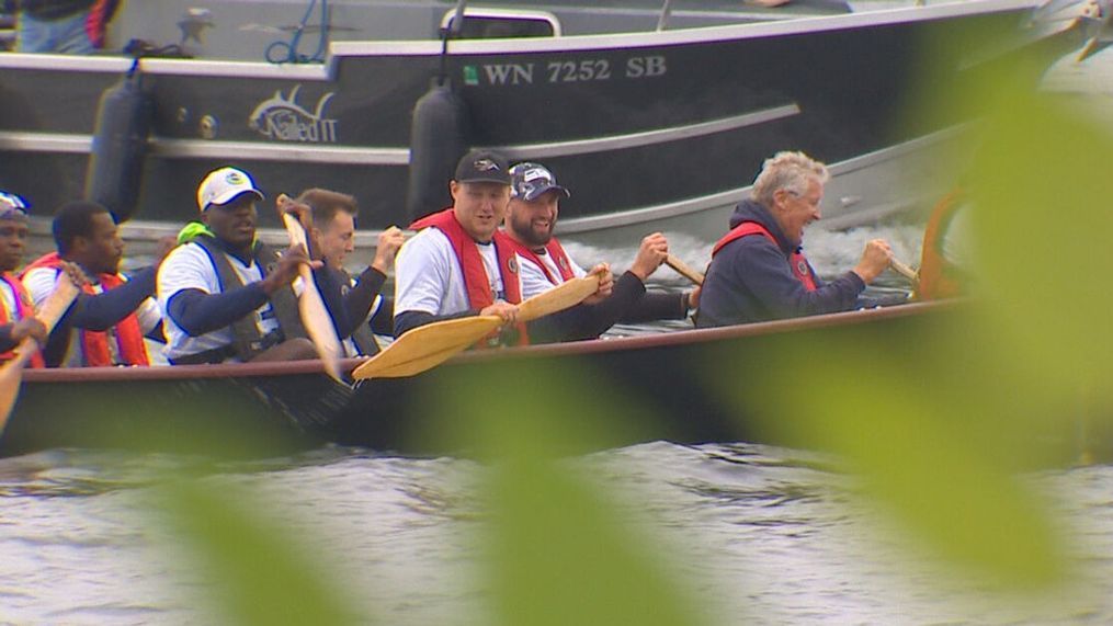 Head coach Pete Carroll paddles a canoe with a group of Seahawks rookies during a team-building exercise on Lake Washington on Tuesday, June 13, 2023. (KOMO News)
