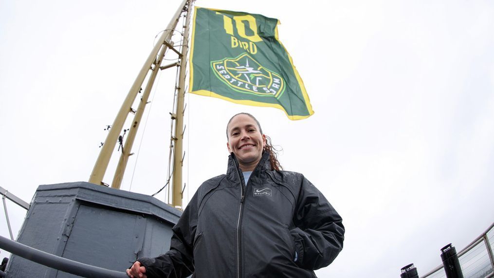 SEATTLE, WASHINGTON - JUNE 09: Sue Bird poses next to her flag, ahead of her Seattle Storm jersey retirement celebration, at The Space Needle on June 09, 2023 in Seattle, Washington. (Photo by Steph Chambers/Getty Images)