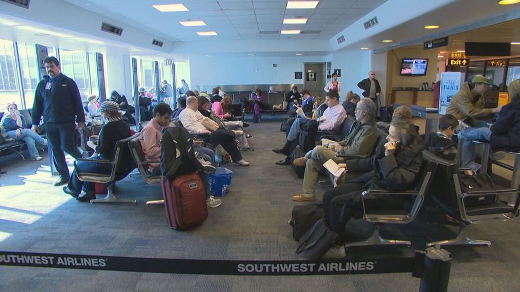 FILE – Travelers wait in an airport terminal before boarding a flight.{&nbsp;}A recent survey by Consumer Reports showed 20% of travelers had gripes related to flight schedules, including things like delays, reschedules and cancellations. Yet most people surveyed did not formally complain to the airline. (Photo: KOMO News via Consumer Reports)