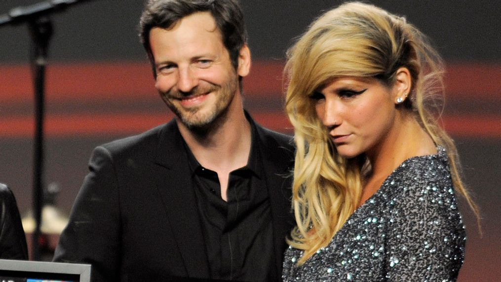 FILE - Songwriter Lukasz "Dr. Luke" Gottwalk, left, poses with singer Kesha after receiving his award at the 28th Annual ASCAP Pop Music Awards in Los Angeles, April 27, 2011. (AP Photo/Chris Pizzello, File)