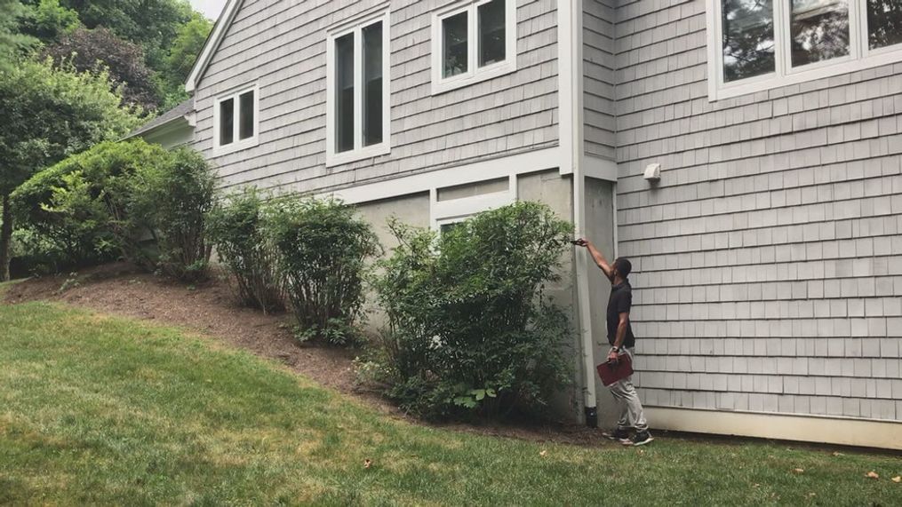 FILE – A inspector examines a home before it’s sold. With homeowners’ insurance premiums expected to rise faster than inflation, Consumer Reports says now is the time to shop around. (Photo: KOMO News via Consumer Reports){br}