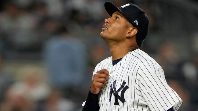 New York Yankees starting pitcher Jhony Brito (76) is relieved in the sixth inning of a baseball game against the Seattle Mariners, Wednesday, June 21, 2023, in New York. (AP Photo/John Minchillo)